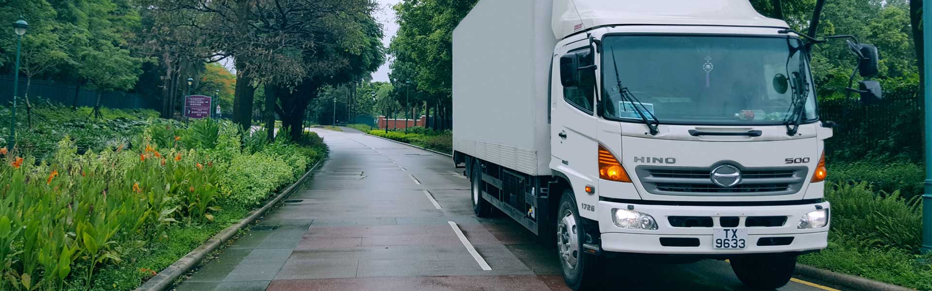 Transportation Services - handling inbound and outbound daytime and territory-wide delivery of bulk cargo, terminal pick-up, airport pick-up, refrigerated freight, valuables, records, dangerous chemicals, heavy goods, exhibition move-in and move-out, site deliveries